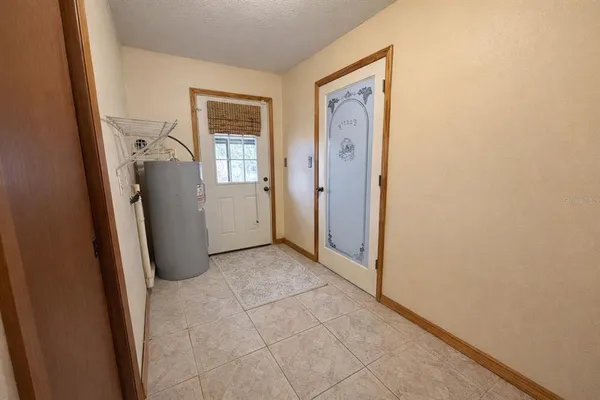 a view of a storage & utility room with closet
