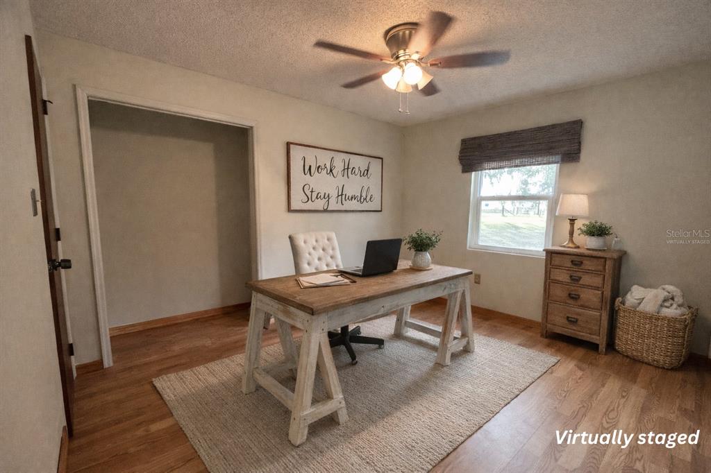 5028 Ralston Road Lakeland, FL 33811 - Photo 10 of 29 a workspace with furniture and window