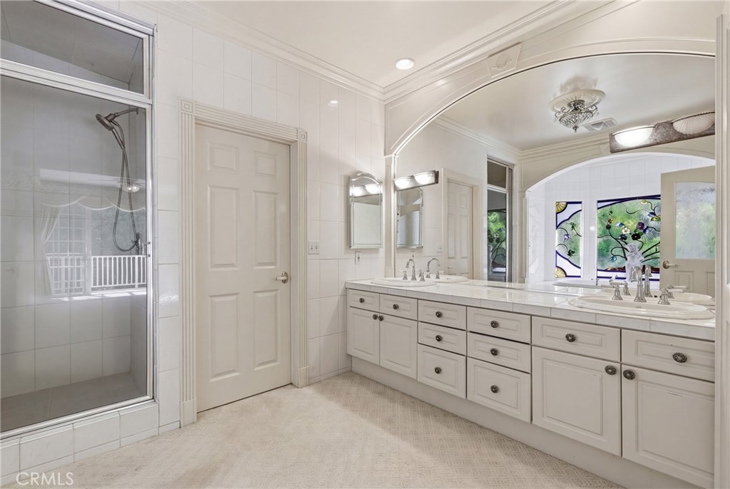 960 Hampton Road Arcadia, CA 91006 - Photo 14 of 28 a bathroom with a granite countertop sink mirror and