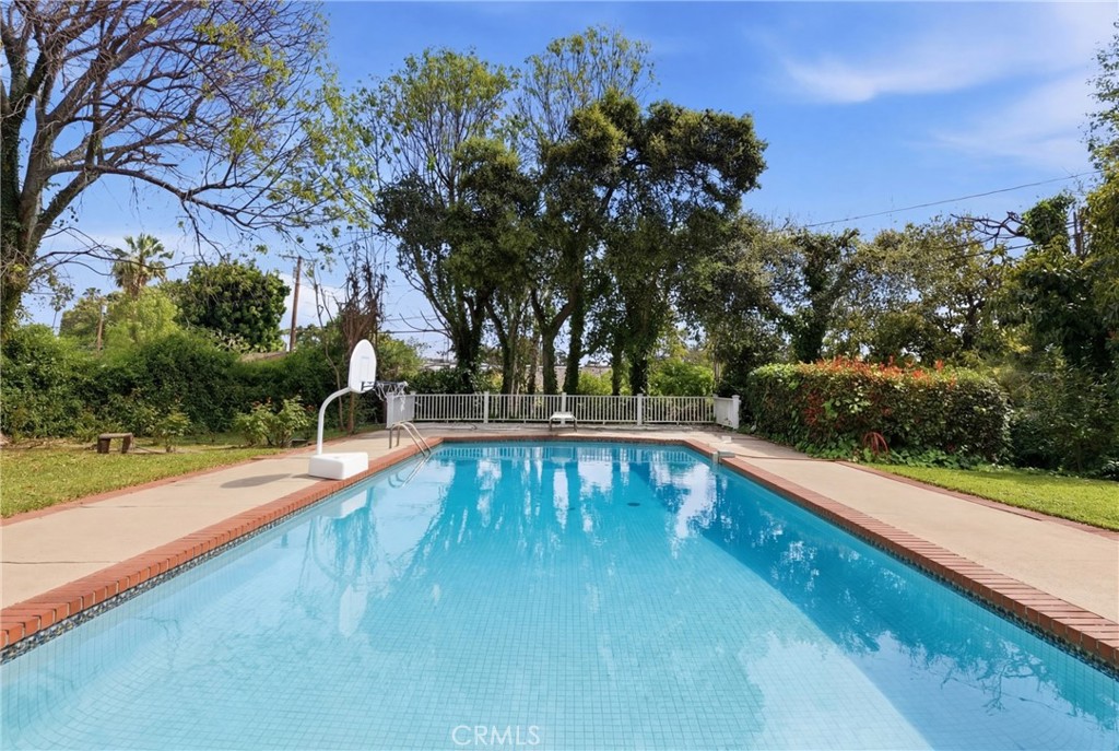 960 Hampton Road Arcadia, CA 91006 - Photo 20 of 28 a view of a swimming pool with a patio
