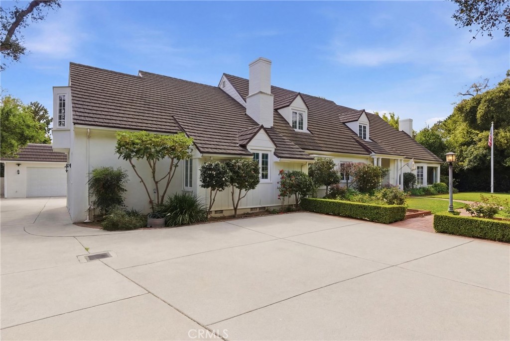 960 Hampton Road Arcadia, CA 91006 - Photo 2 of 28 a view of a house with a yard and potted plants
