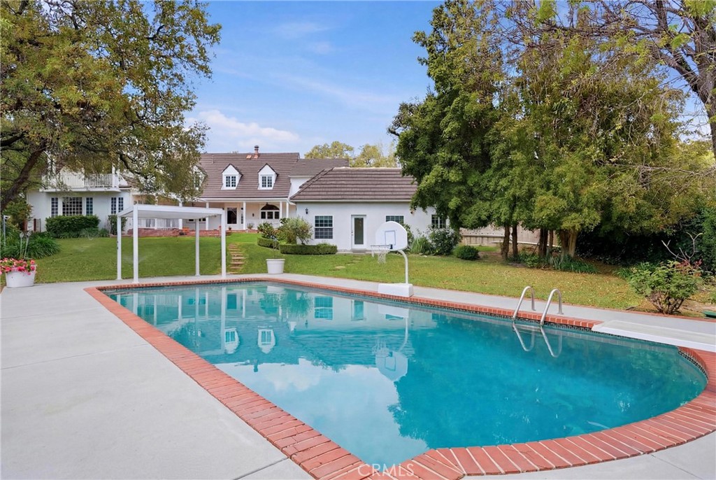 960 Hampton Road Arcadia, CA 91006 - Photo 21 of 28 a view of a swimming pool with a patio