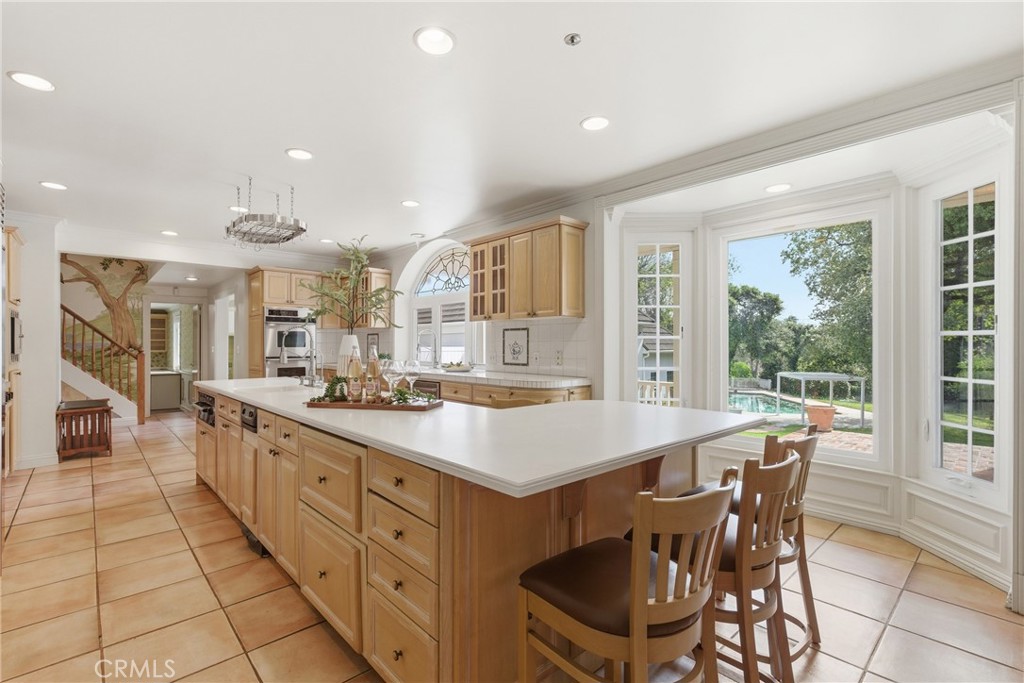960 Hampton Road Arcadia, CA 91006 - Photo 10 of 28 a large kitchen with kitchen island a large island in it