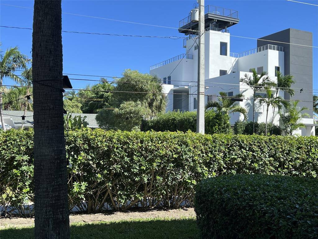 505 Northeast 20th Avenue, Unit 118 Deerfield Beach, FL 33441 - Photo 18 of 22 a view of a back yard