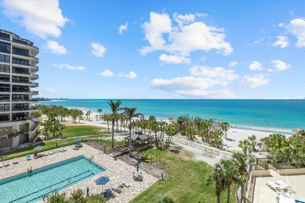 a view of a city with an ocean