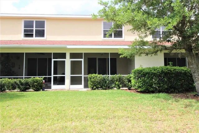 a view of a field with trees