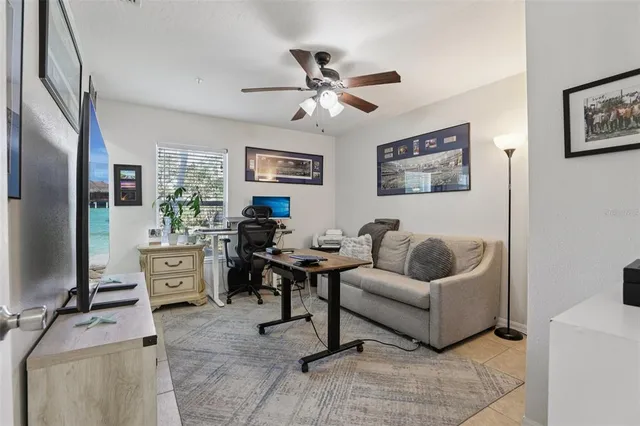 a view of a livingroom with furniture and window