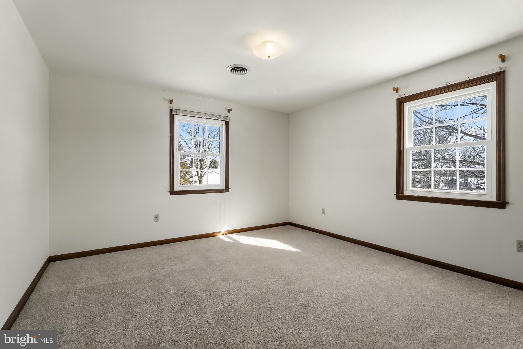 7823 Timmons Road Mount Airy, MD 21771 - Photo 25 of 38 an empty room with windows and closet