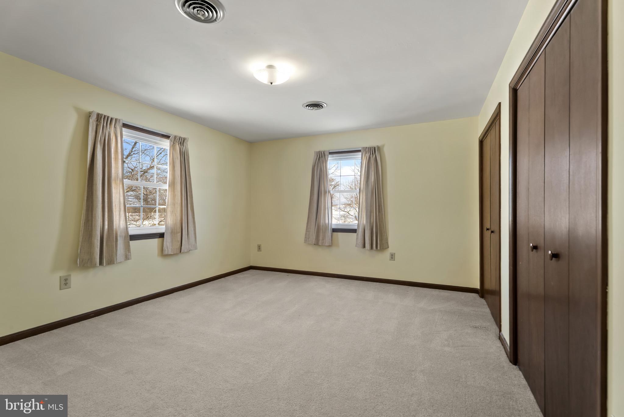 7823 Timmons Road Mount Airy, MD 21771 - Photo 27 of 38 an empty room with windows and closet