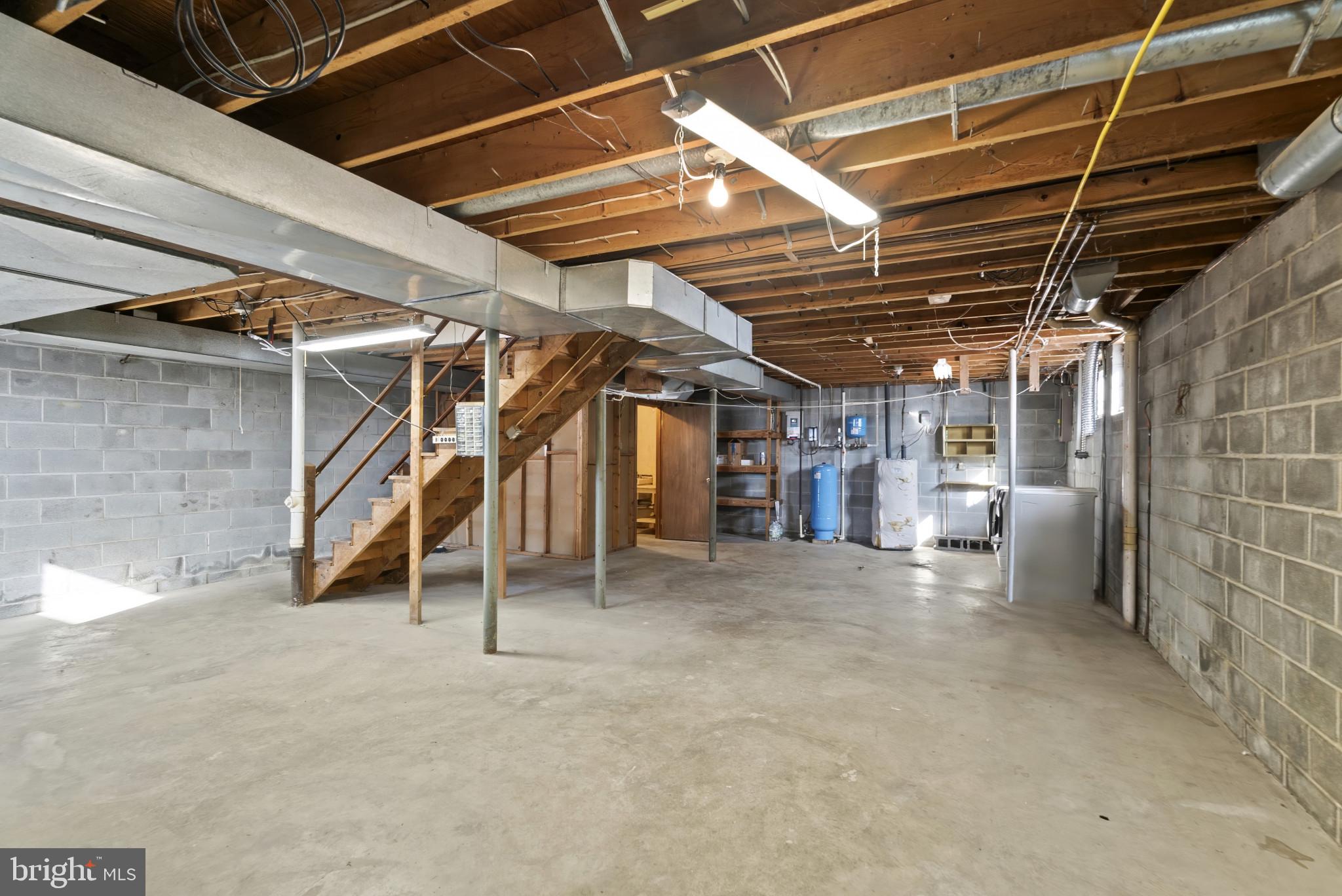 7823 Timmons Road Mount Airy, MD 21771 - Photo 32 of 38 a view of empty room with wooden ceiling