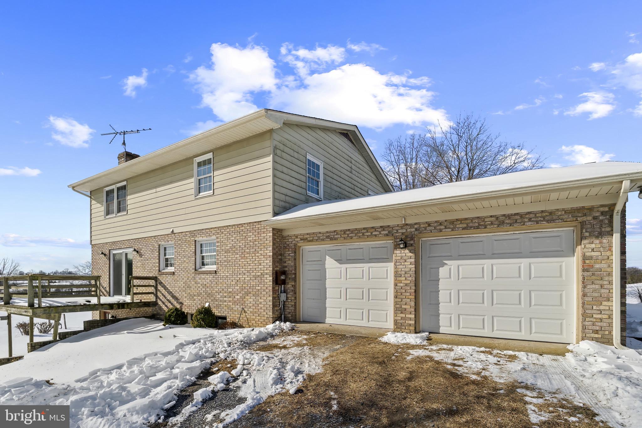 7823 Timmons Road Mount Airy, MD 21771 - Photo 35 of 38 a view of a house with a patio