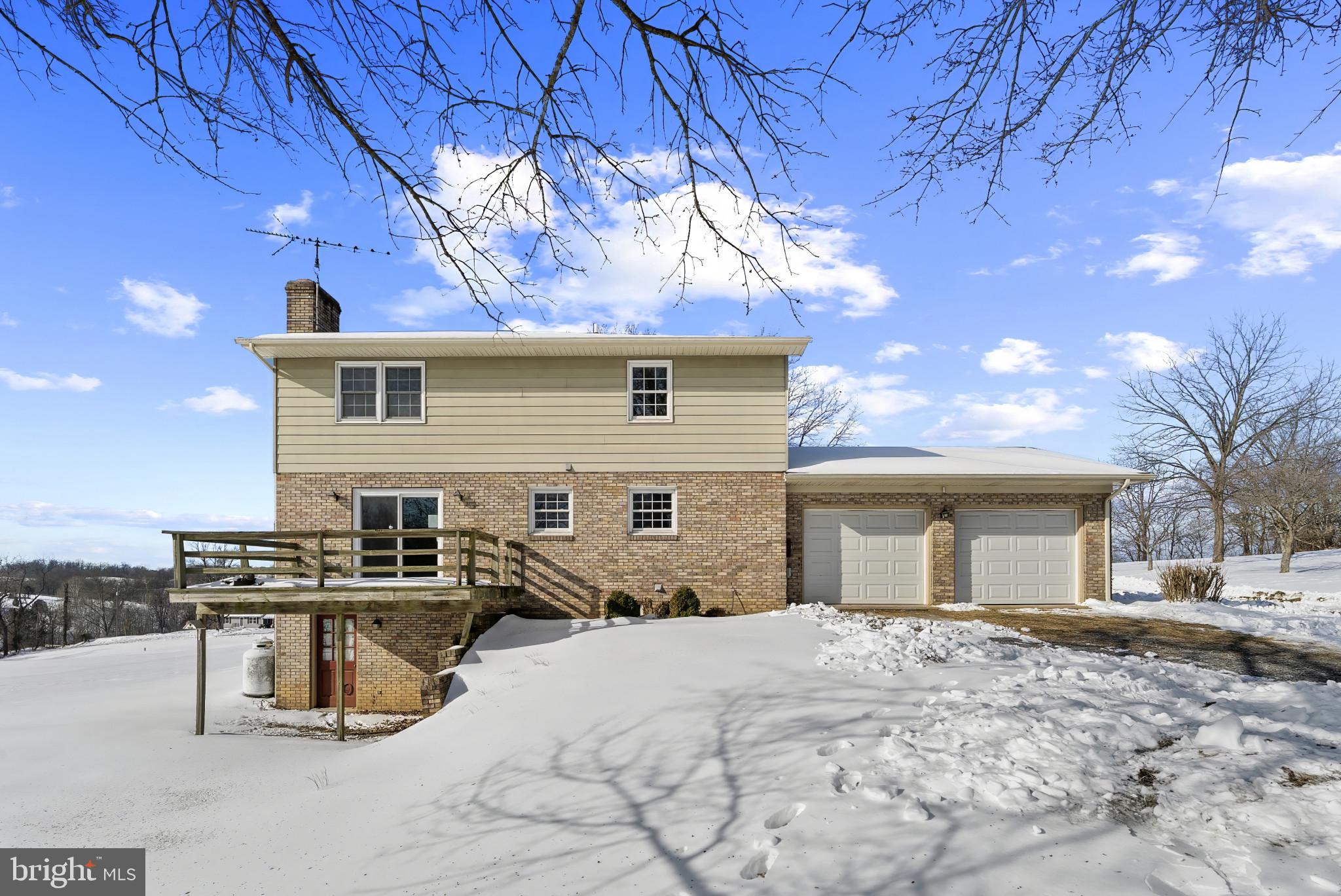 7823 Timmons Road Mount Airy, MD 21771 - Photo 36 of 38 a view of a backyard with sitting area
