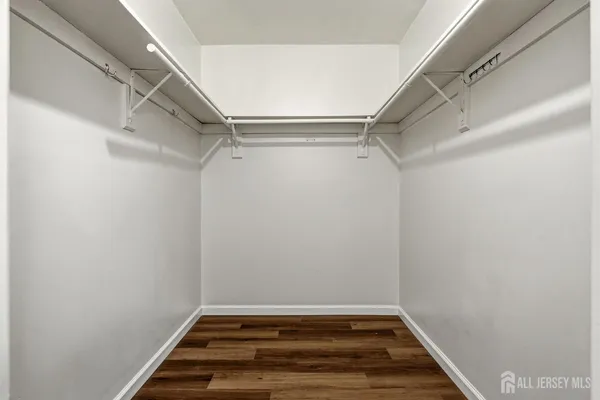 a view of a room with racks on the wall