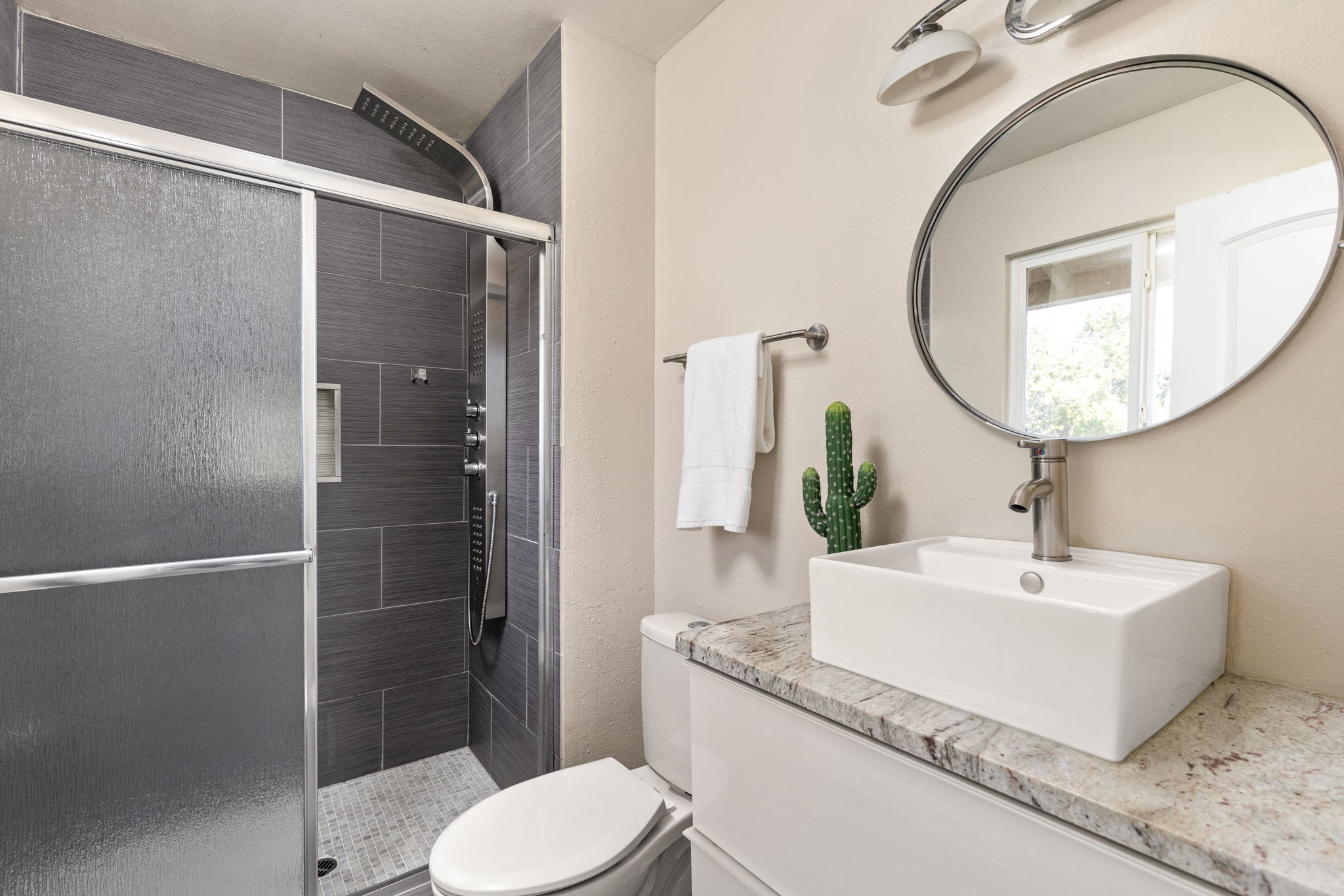 6502 Highpoint Cove Austin, TX 78723 - Photo 24 of 40 Bathroom featuring vanity and a stall shower