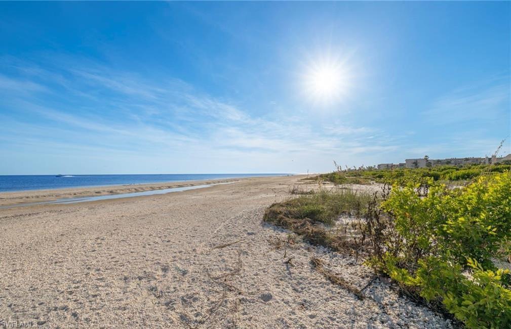 849 Beach Road Sanibel, FL 33957 - Photo 26 of 27 a view of an ocean and beach