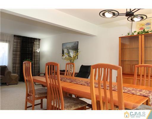 93 South Cliff Road Colonia, NJ 07067 - Photo 18 of 25 a view of a dining room with furniture