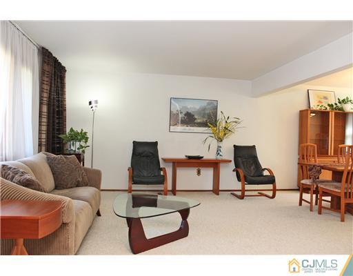 93 South Cliff Road Colonia, NJ 07067 - Photo 3 of 25 a living room with furniture