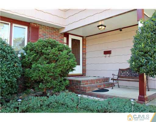 93 South Cliff Road Colonia, NJ 07067 - Photo 23 of 25 a view of backyard with a patio