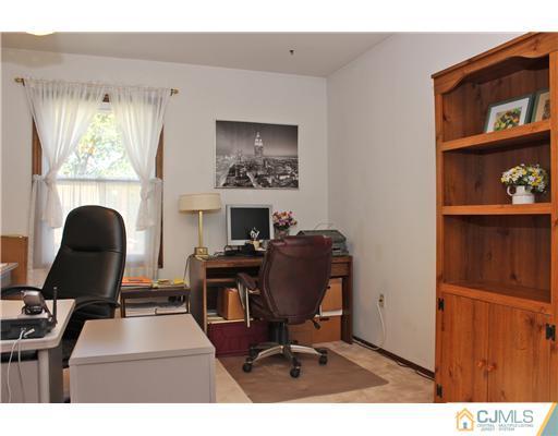 93 South Cliff Road Colonia, NJ 07067 - Photo 10 of 25 a view of a workspace with furniture and a window