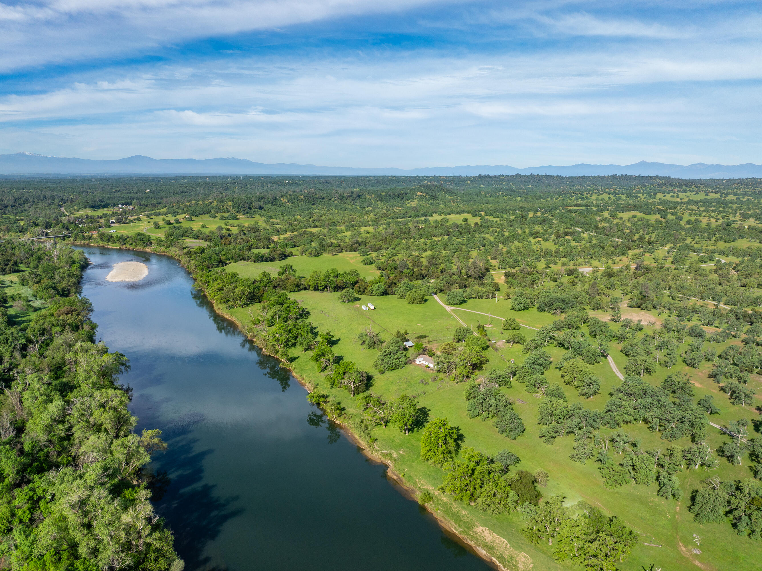 22080 Forbes Way Red Bluff, CA 96080 - Photo 14 of 42 a view of a lake with a yard