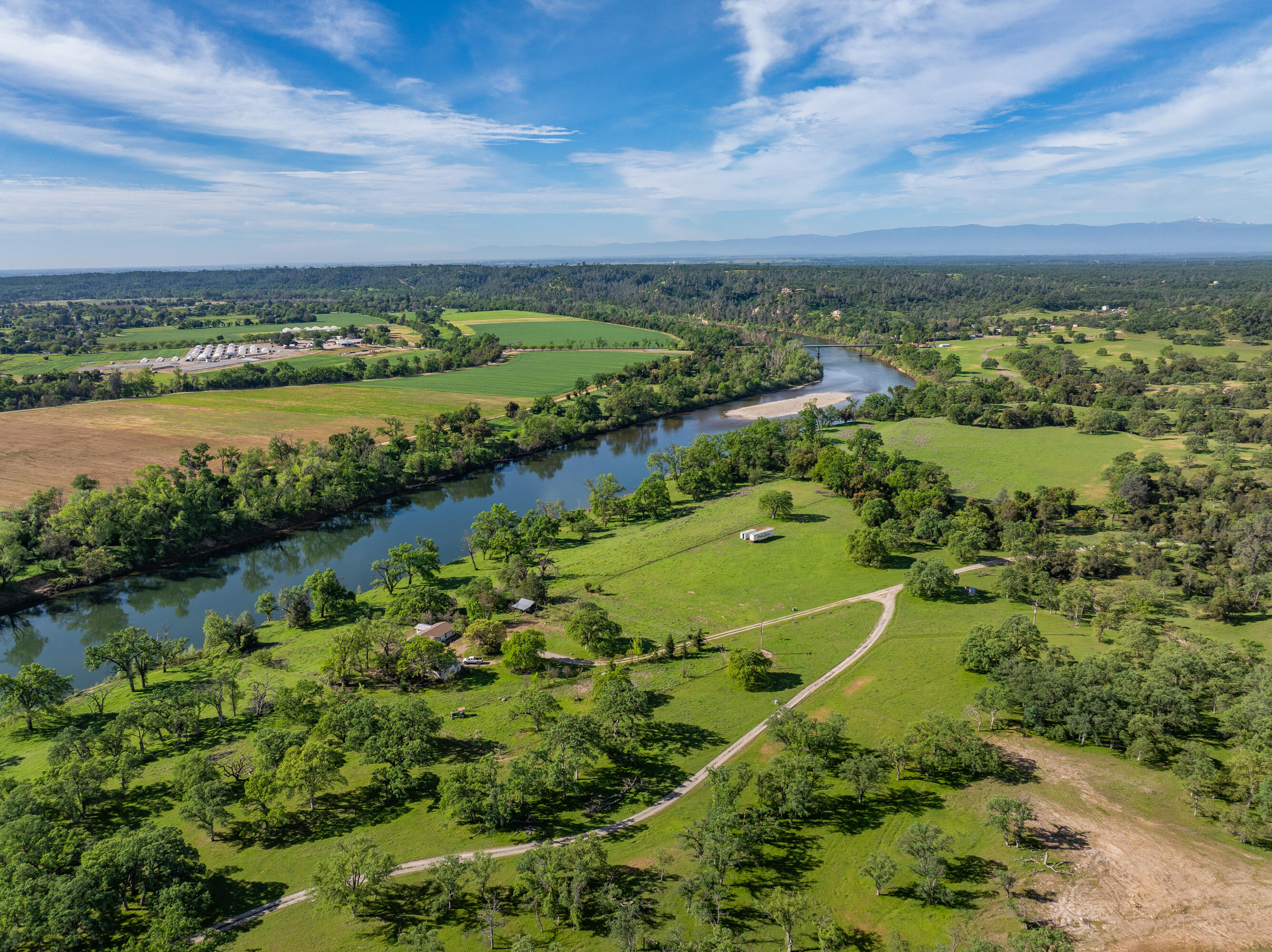 22080 Forbes Way Red Bluff, CA 96080 - Photo 15 of 42 an aerial view of a city with lots of residential buildings lake and ocean view