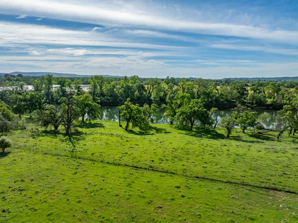 a view of backyard with green space
