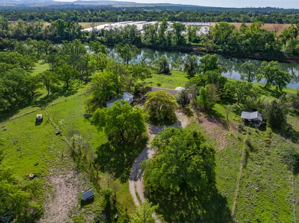a view of lake with green space