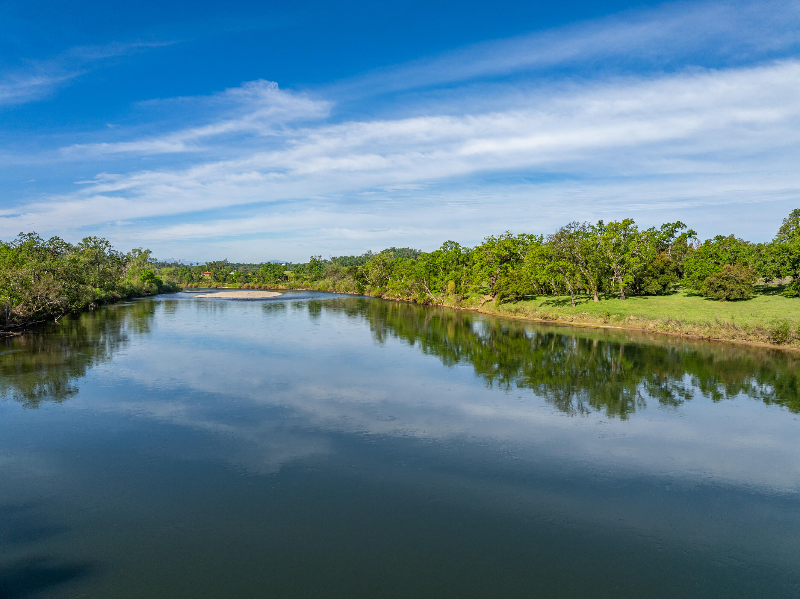 22080 Forbes Way Red Bluff, CA 96080 - Photo 39 of 42 a view of a lake with houses in the back