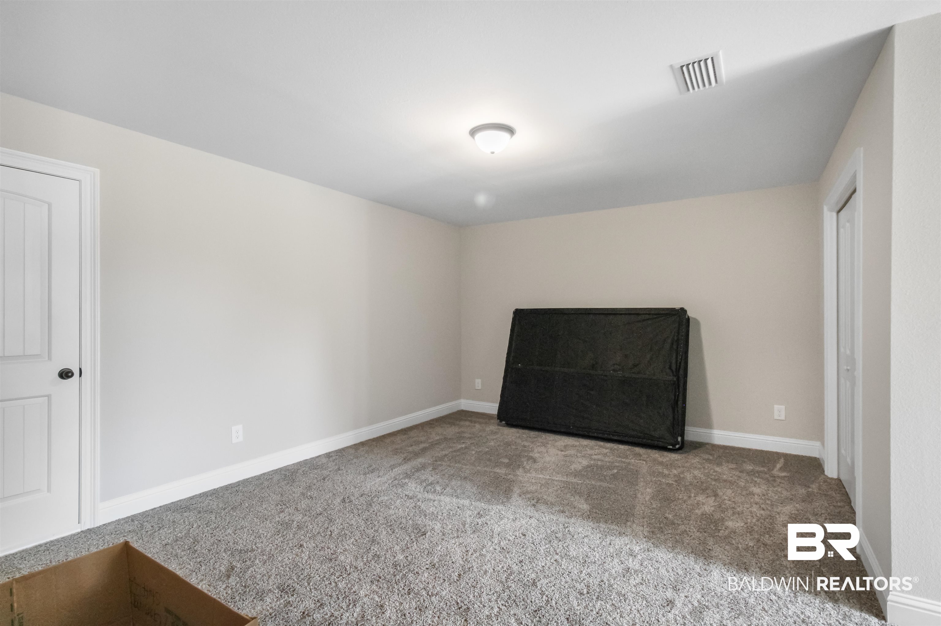 26197 Eagle Trace Elberta, AL 36530 - Photo 10 of 26 View of carpeted spare room