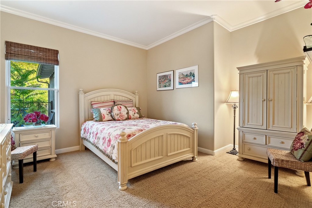 2438 Battering Rock Road Templeton, CA 93465 - Photo 17 of 60 a bedroom with a bed chair and window