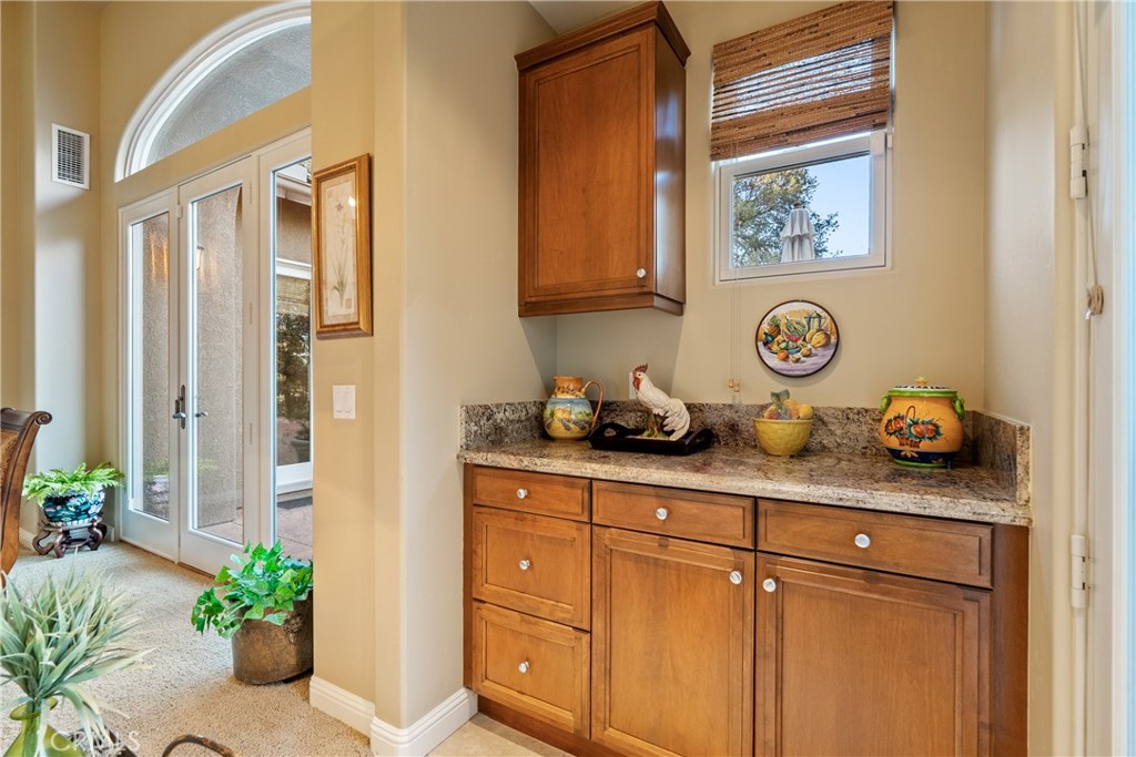 2438 Battering Rock Road Templeton, CA 93465 - Photo 25 of 60 a bathroom with a granite countertop sink a potted plant and a window