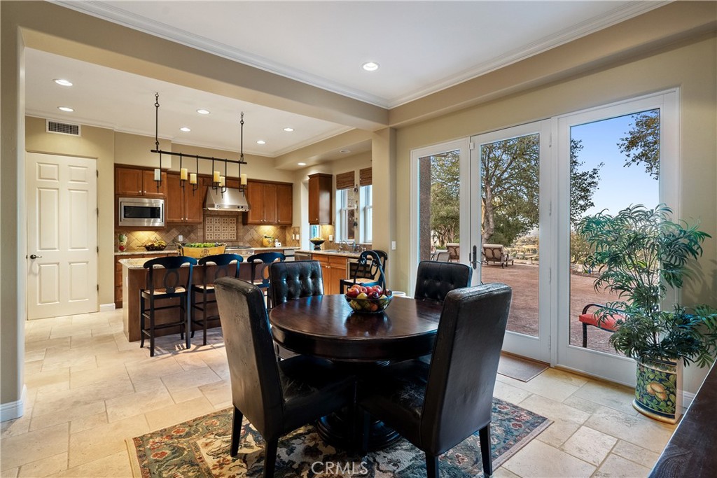 2438 Battering Rock Road Templeton, CA 93465 - Photo 28 of 60 a view of a dining room with furniture window and outside view