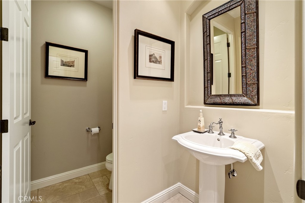 2438 Battering Rock Road Templeton, CA 93465 - Photo 41 of 60 a bathroom with a sink and a mirror