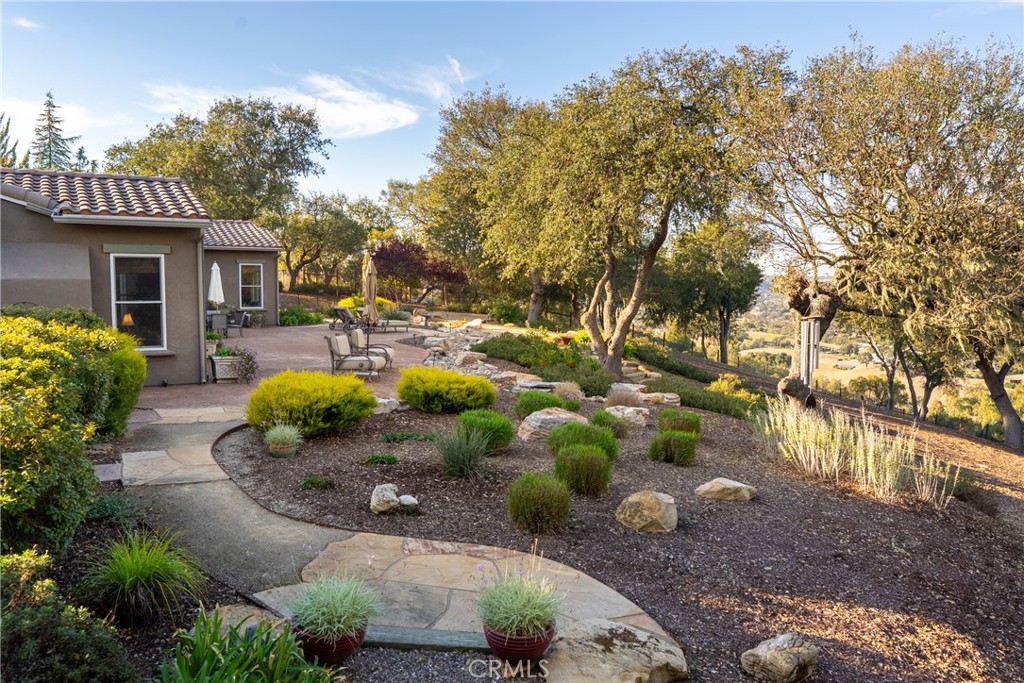 2438 Battering Rock Road Templeton, CA 93465 - Photo 48 of 60 a view of a backyard with plants and outdoor seating