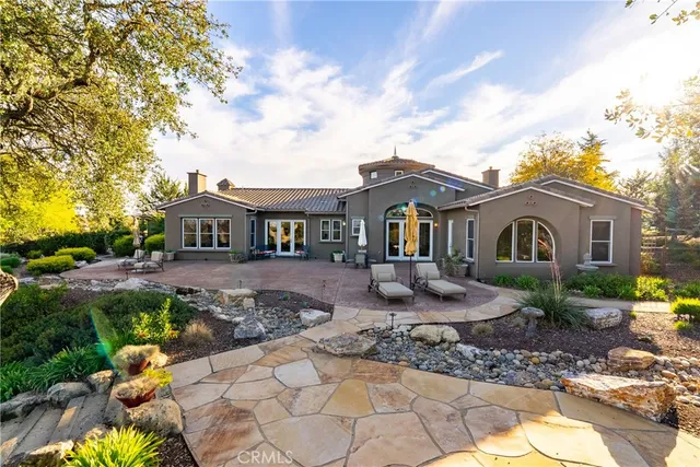 a view of a swimming pool with a yard