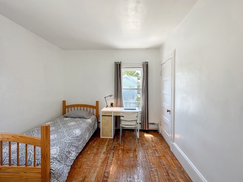 82 Jefferson Avenue Everett, MA 02149 - Photo 24 of 37 a very nice looking room with a large window