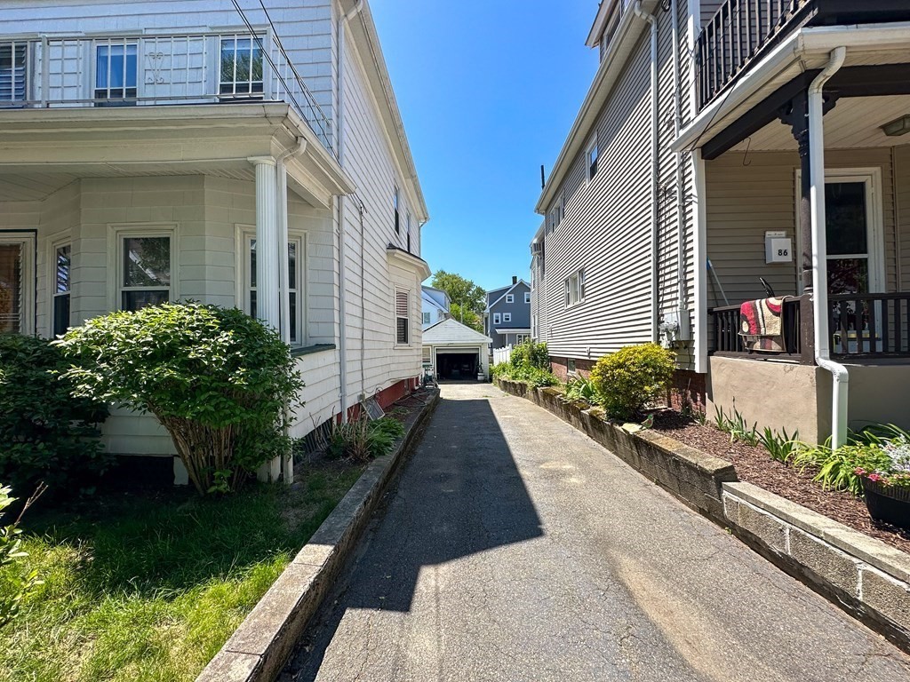 82 Jefferson Avenue Everett, MA 02149 - Photo 32 of 37 a view of a house with backyard and garden