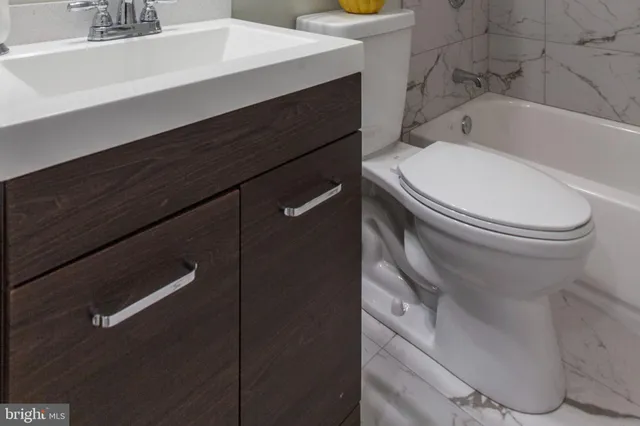 a bathroom with a sink and a toilet