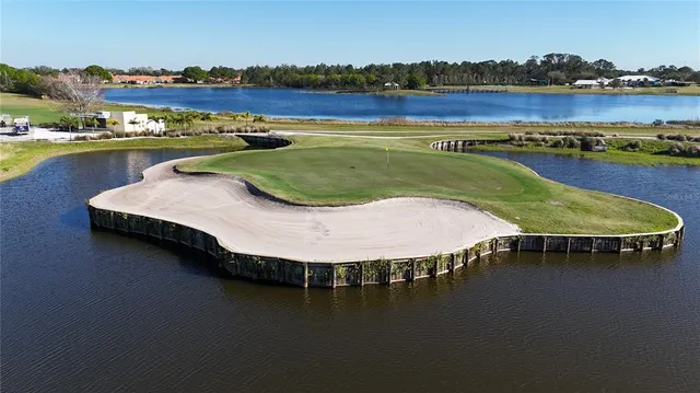 an aerial view of a swimming pool and outdoor space