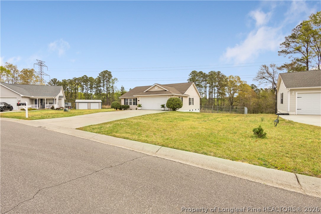 253 Farmstead Court Rockingham, NC 28379 - Photo 3 of 25 a view of an ocean with residential apartment building in the background