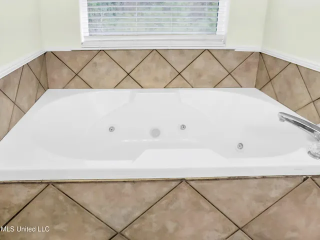 $350,000 | 1405 Rue Versailles, Gautier, MS 39553