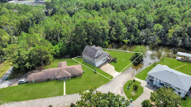 $350,000 | 1405 Rue Versailles, Gautier, MS 39553