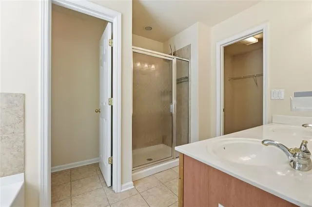 a bathroom with a sink double vanity and a mirror