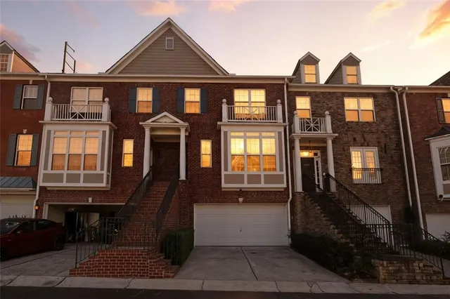 a front view of a house with a porch