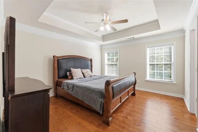 a bed room with bed and window