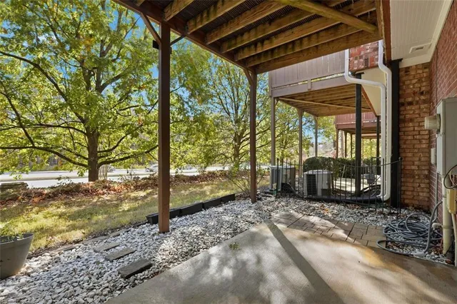 a view of a building with a tree