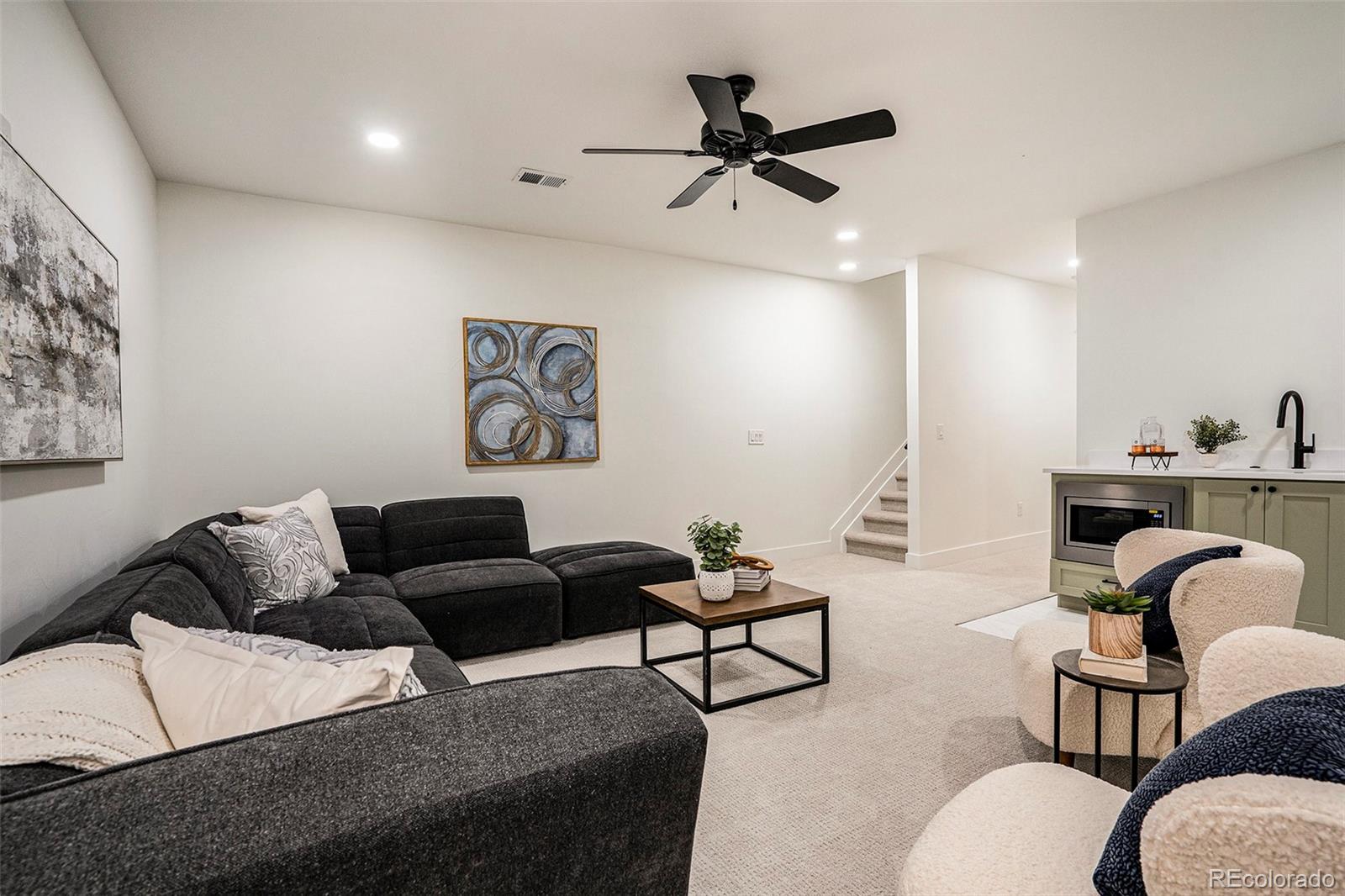 3271 Perry Street Denver, CO 80212 - Photo 25 of 34 a living room with furniture and white walls