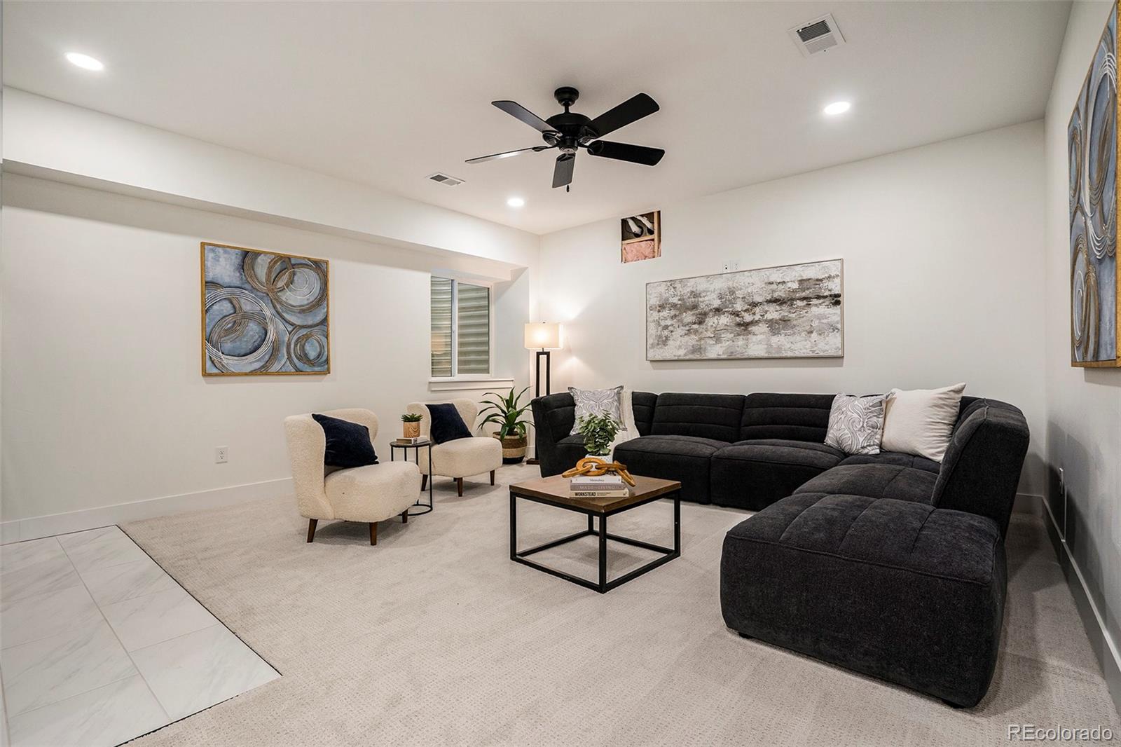 3271 Perry Street Denver, CO 80212 - Photo 26 of 34 a living room with furniture and a window