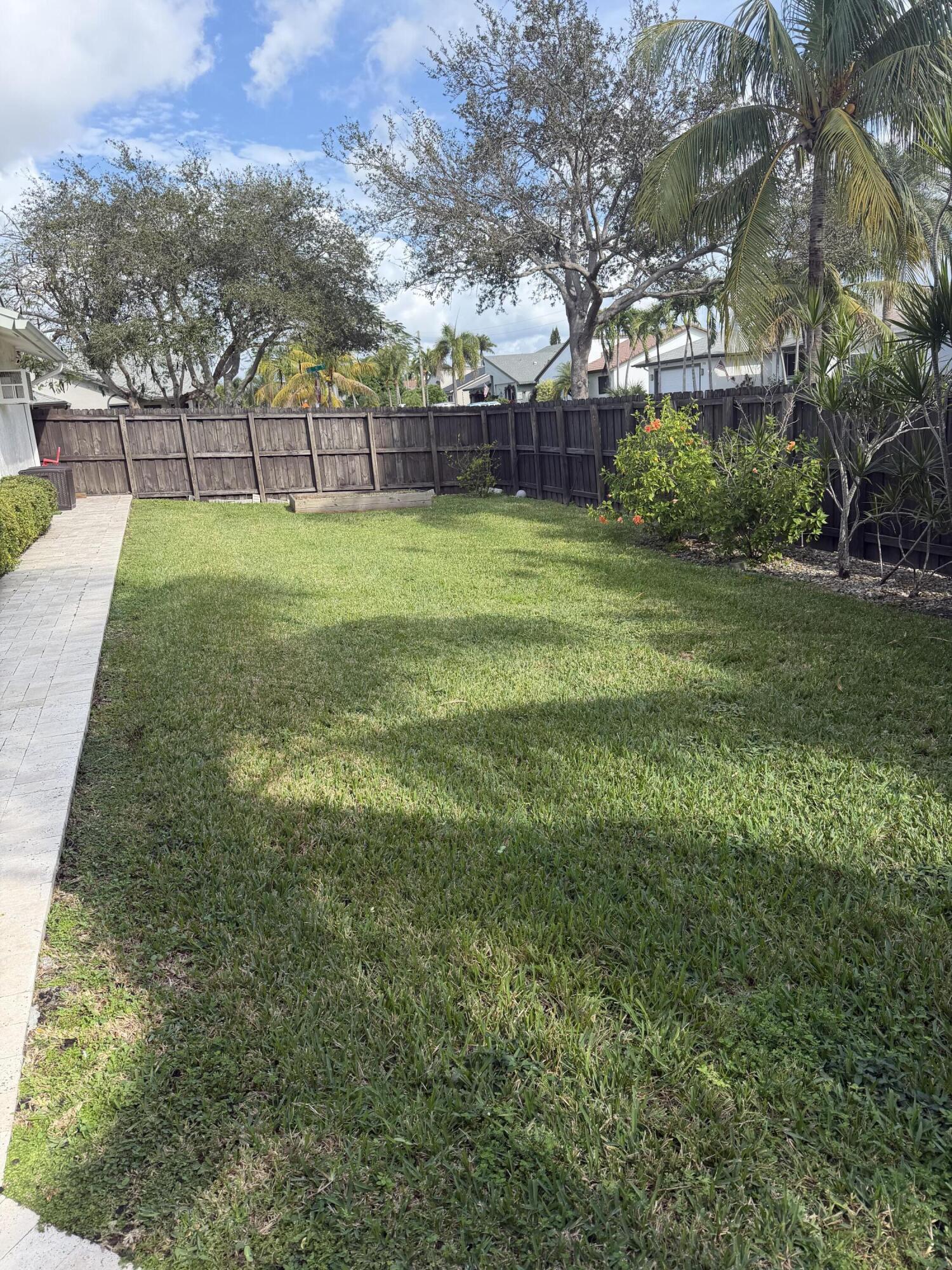 236 Southeast 9th Street Dania, FL 33004 - Photo 22 of 25 a view of a park with a house in the background