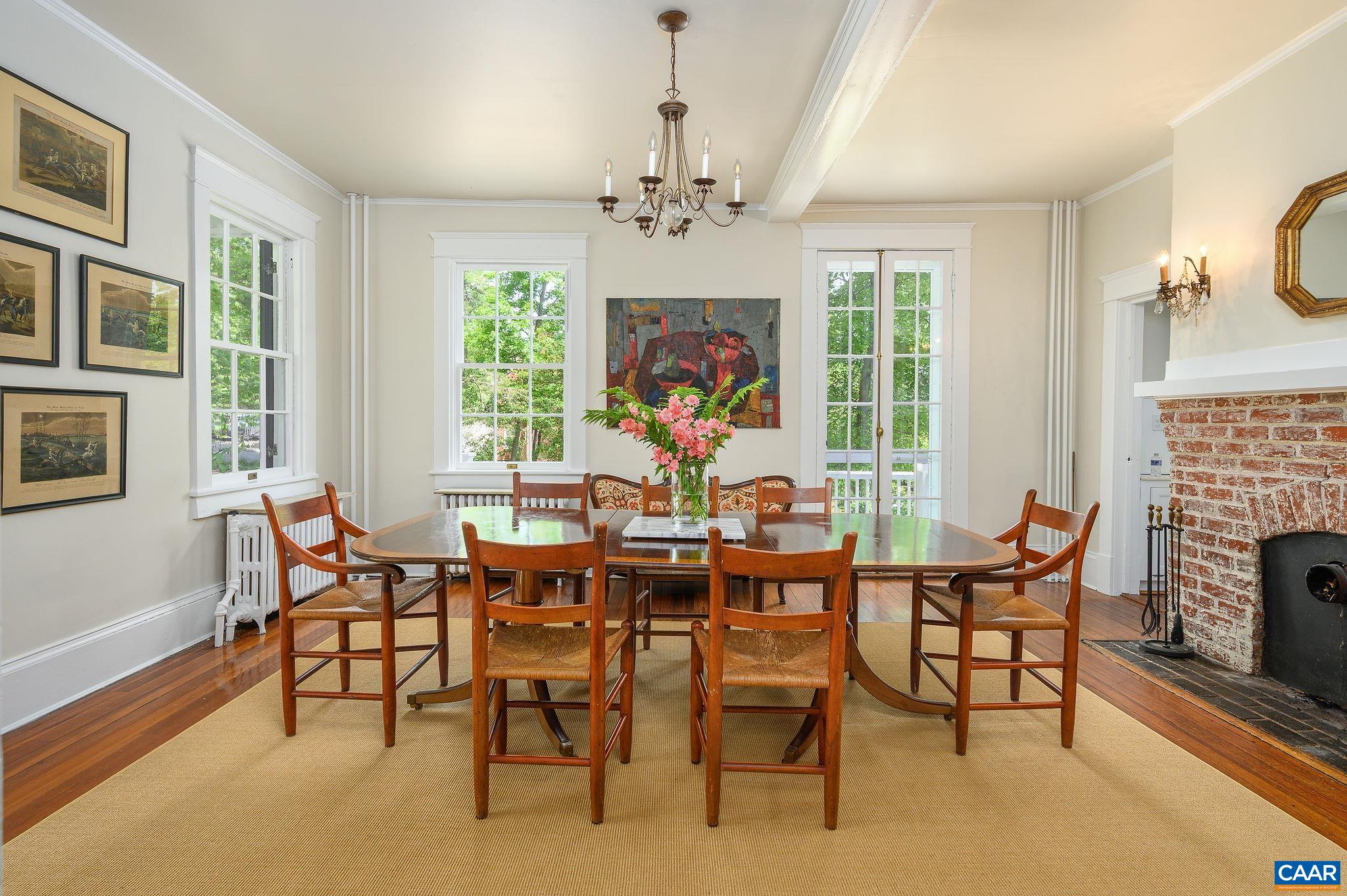 1326 Rugby Road Charlottesville, VA 22903 - Photo 12 of 65 a view of a dining room with furniture window and outside view